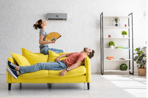 AC blowing hot air